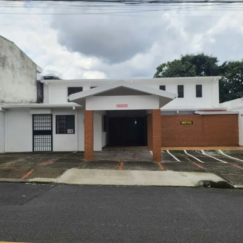 House with space for administrative offices, two stories