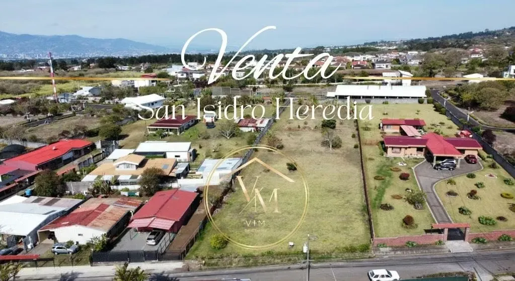 Large lot with flat topography, located in San Isidro de Heredia near the school.